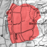 Digital modellierte Karte in Grautönen, eine darauf eingezeichnete Hangrutschung ist rot eingefäbt.